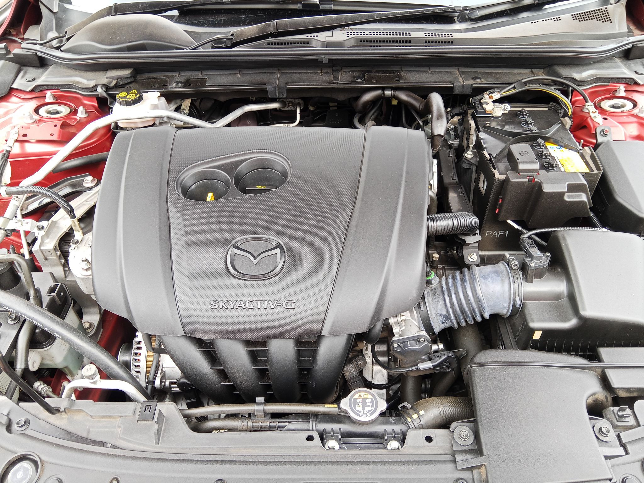 Lelang Mobil MAZDA 3 HATCHBACK 2.0 AT 2023 MERAH METALIK JAKARTA TIPAR